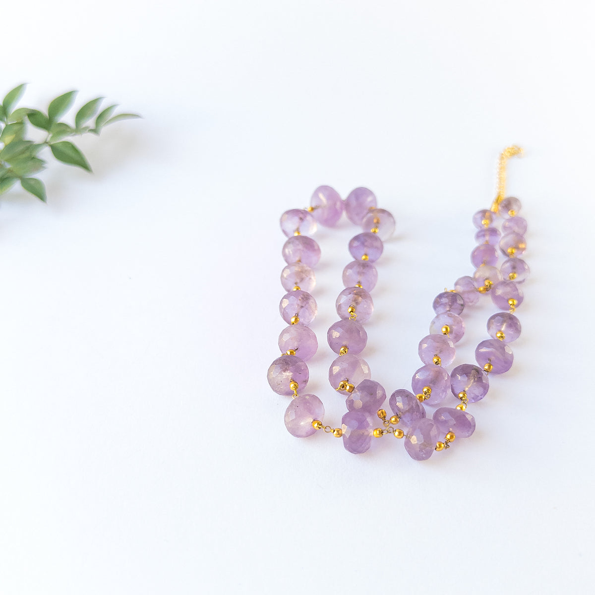 High‑quality faceted rondelle Amethyst beads with polished brilliance and elegant arrangement ideal for handcrafted jewellery.