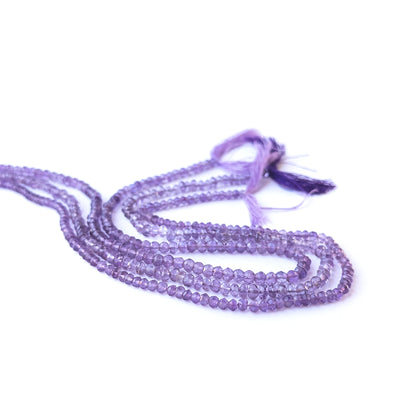 Authentic amethyst gemstone beads with shimmering faceted rondelle cuts, ideal for handmade jewellery components.