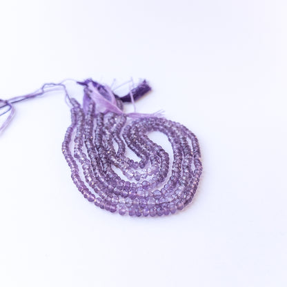Genuine stone beads in soft purple hues, featuring mixed‑size faceted rondelles for DIY jewellery making.