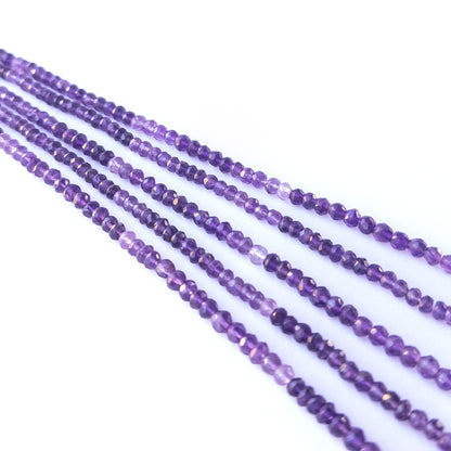 Handmade jewellery components featuring authentic Amethyst faceted rondelle beads with bright purple sparkle.