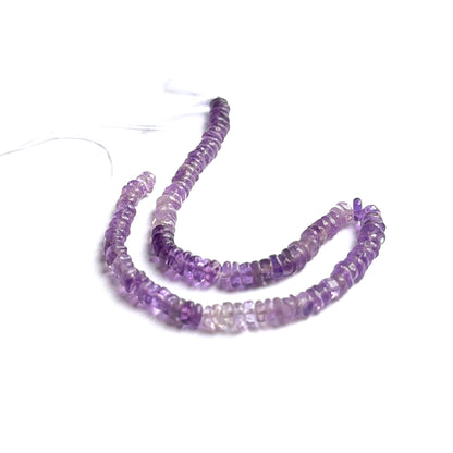 Amethyst smooth heishi beads photographed to show clarity, colour and natural gemstone beauty.