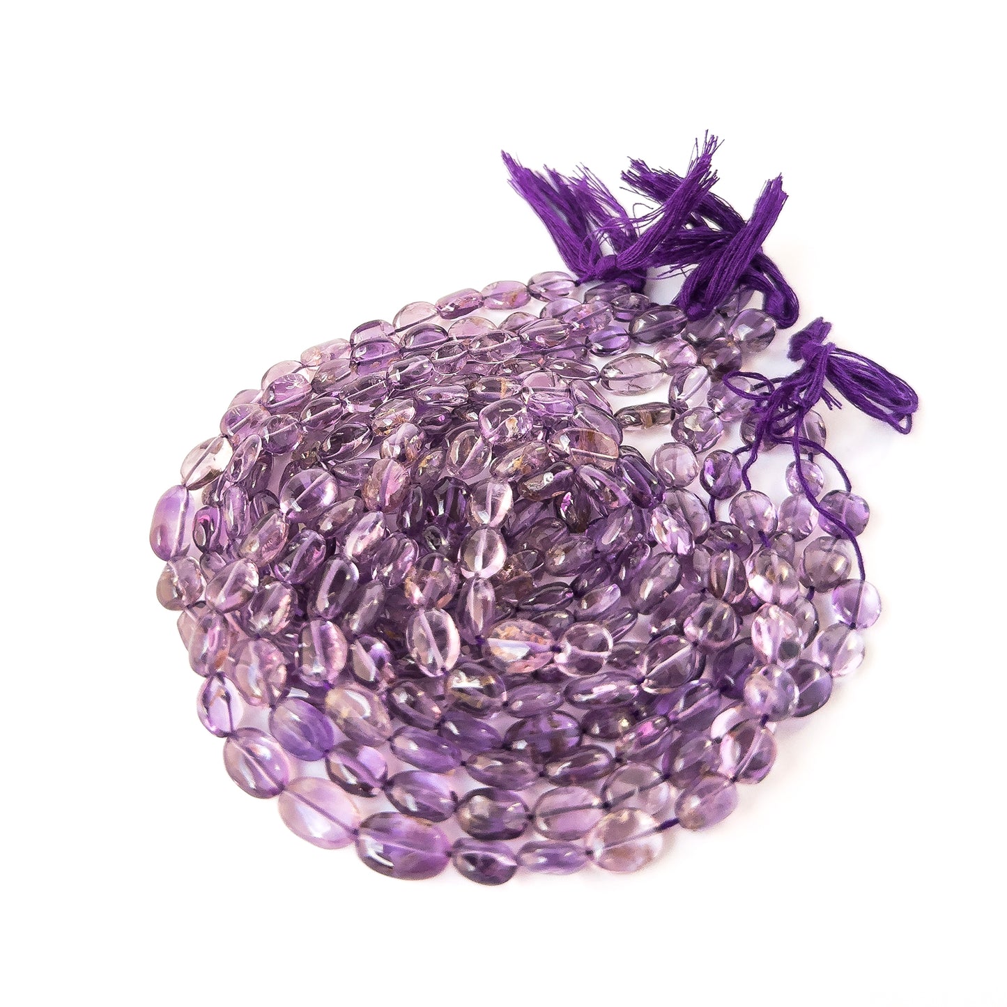 Elegant Amethyst oval beads with polished surfaces, ideal for handmade jewellery components and beadwork.