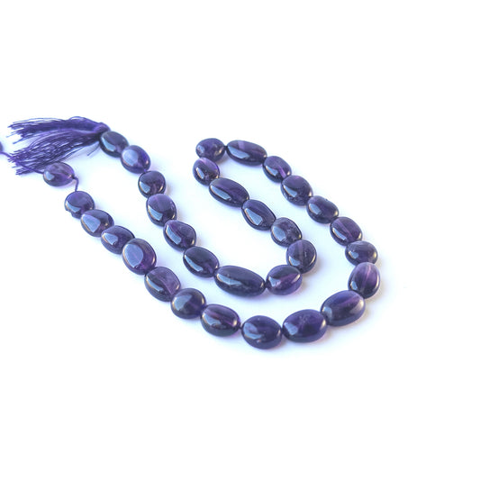Genuine amethyst stone beads with polished smooth oval shaping, ideal for DIY jewellery and artisan beadwork.