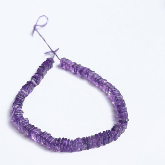 Smooth square amethyst heishi beads displayed with clean surfaces ideal for gemstone jewellery making.