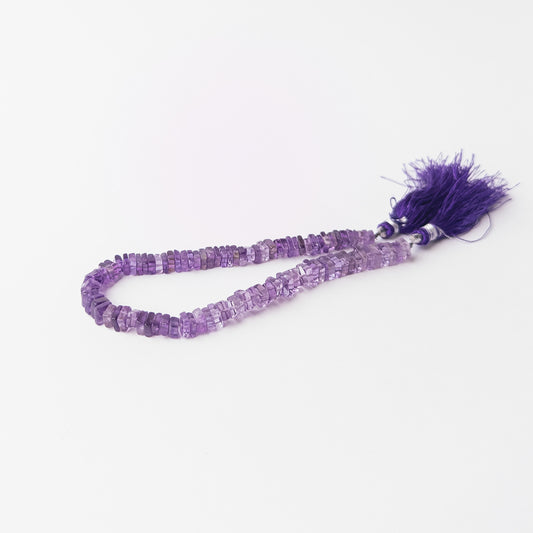 Genuine Amethyst gemstone beads showcasing rich purple colour and carefully crafted geometric bead profiles.
