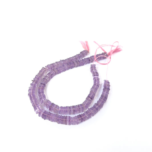 Amethyst smooth square heishi beads in rich purple tones arranged on a strand for handmade jewellery components.