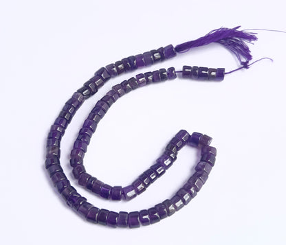 Amethyst smooth wheel beads in deep purple tones strung on a 30cm strand.