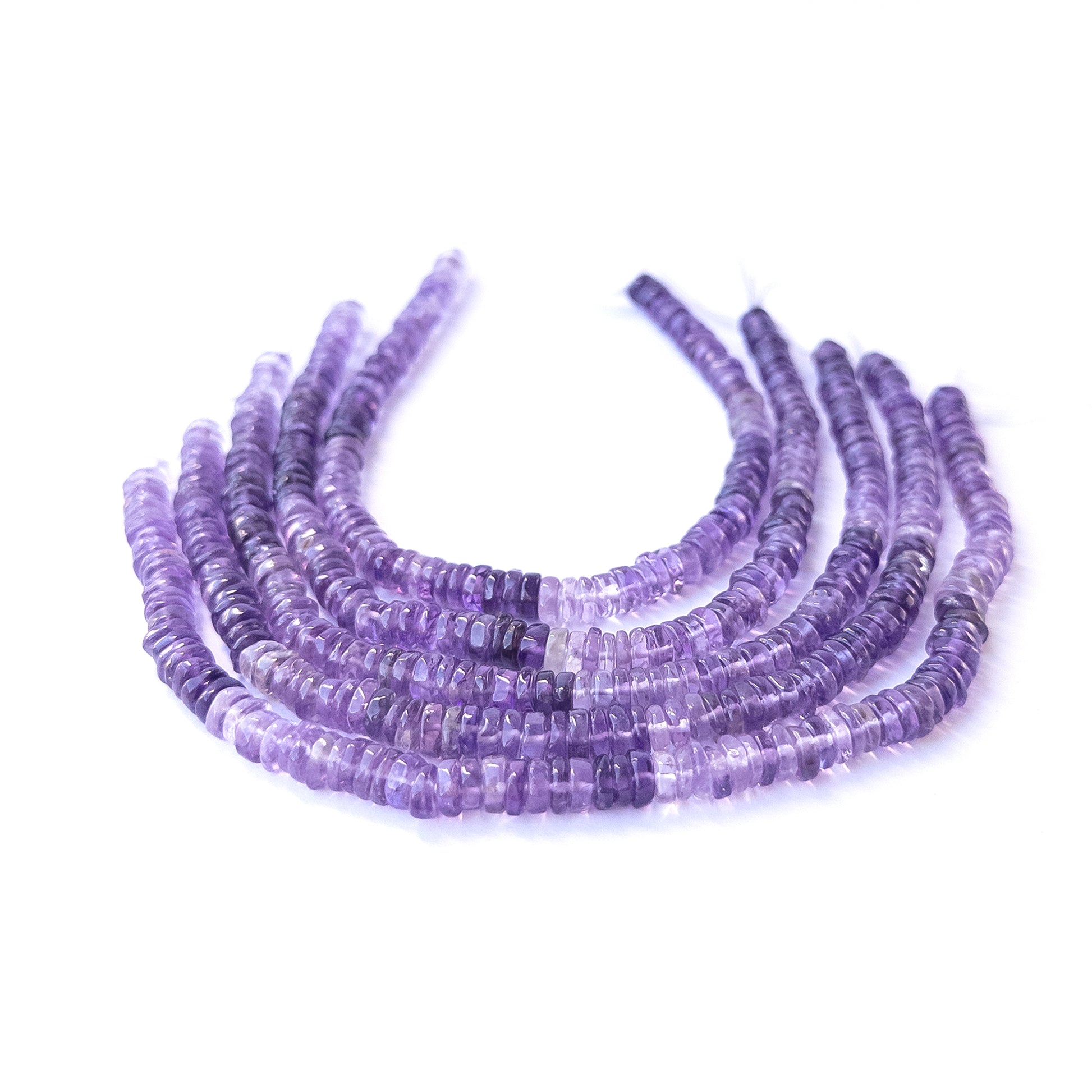 Amethyst smooth wheel gemstone beads in 6–6.3mm size arranged on a 20cm strand for handmade jewellery designs.