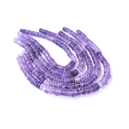 Authentic amethyst gemstone beads showcasing rich purple tones and uniform smooth wheel cut.