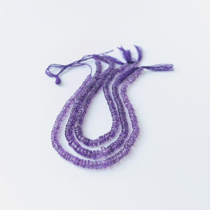 Genuine Amethyst gemstone beads with smooth wheel cut, perfect for artisan jewellery designs.