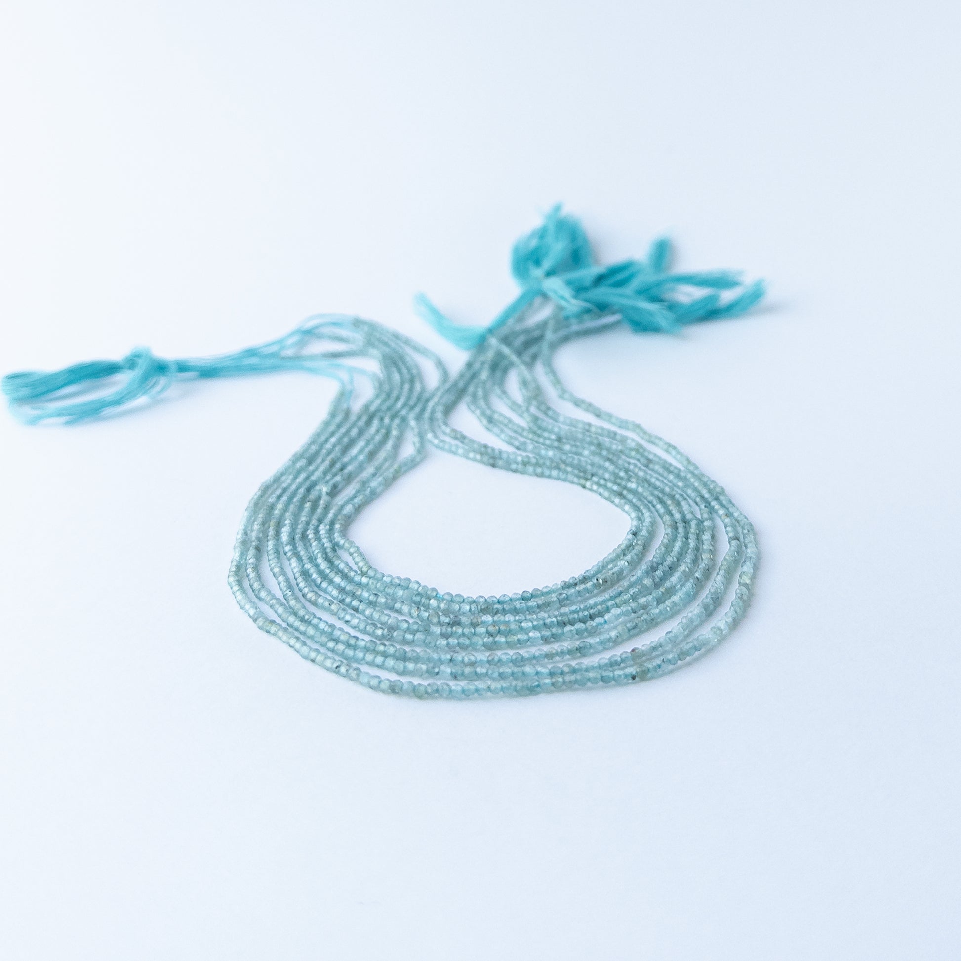 Genuine Apatite stone beads showcasing bright blue colour, fine faceting and high‑quality handmade jewellery components.