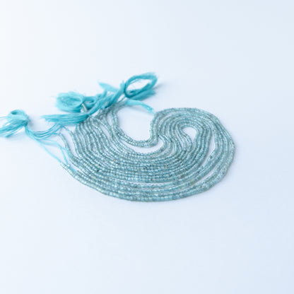 Apatite faceted rondelle beads with vibrant shine, ideal for DIY jewellery makers using authentic gemstone beads.