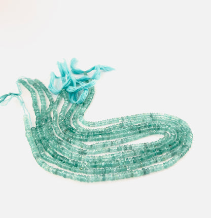 Apatite rondelle beads featuring sharp reflective facets and consistent sizing in both 3.5–3.9mm and 4–4.5mm groups.