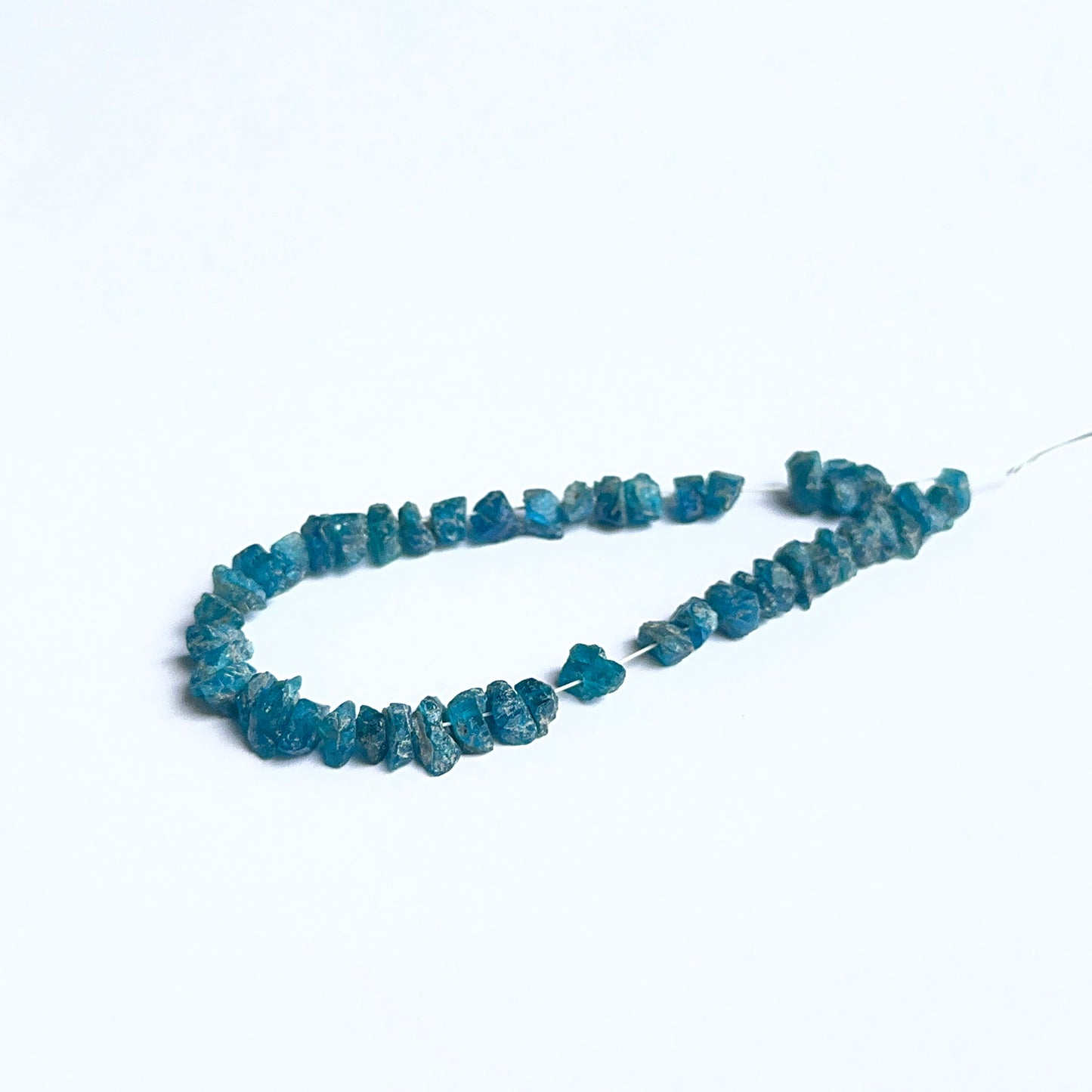 Apatite rough stones arranged neatly to showcase natural gemstone quality and handcrafted appeal.