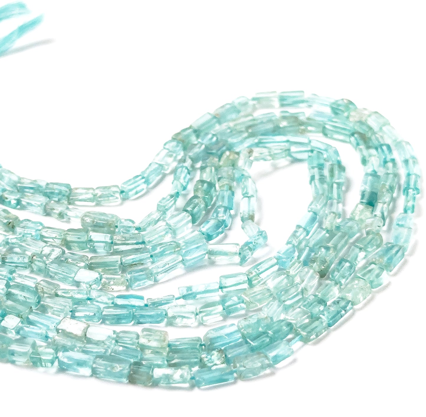 Apatite rectangle heishi beads featuring smooth surfaces, crisp edges, and consistent 3.3–3.5mm sizing.