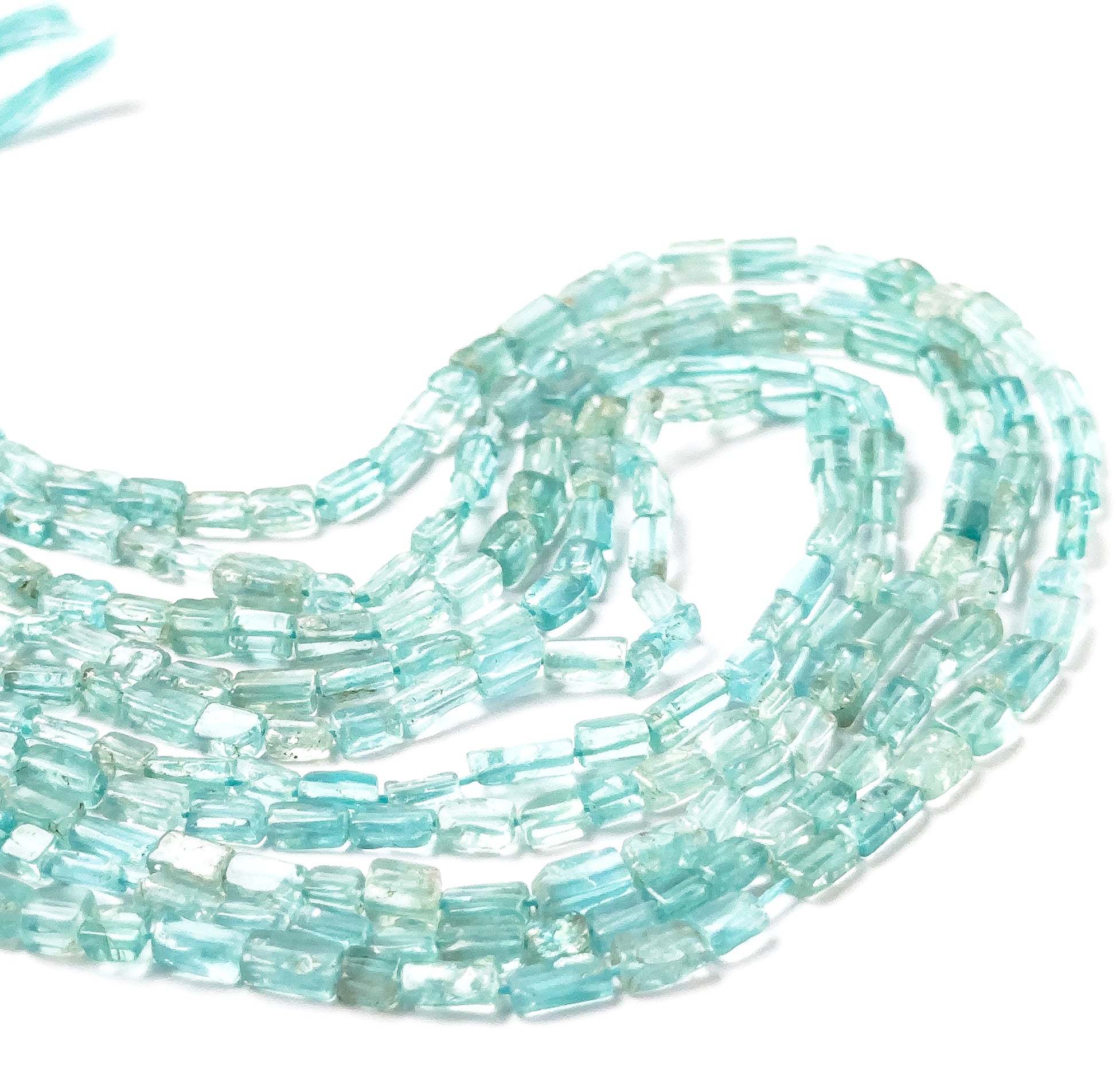 Apatite rectangle heishi beads featuring smooth surfaces, crisp edges, and consistent 3.3–3.5mm sizing.