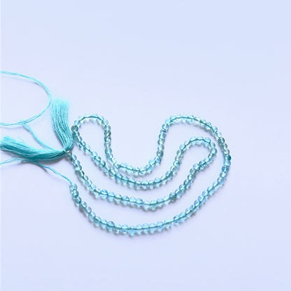 Close‑up of 2.9mm Apatite stone beads showing polished round surfaces ideal for natural gemstone beads for DIY jewellery.