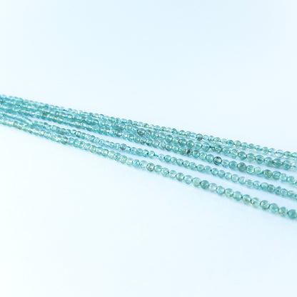 Detailed view of 3.4–3.6mm apatite round beads with smooth polish and vibrant colour for handmade jewellery components.