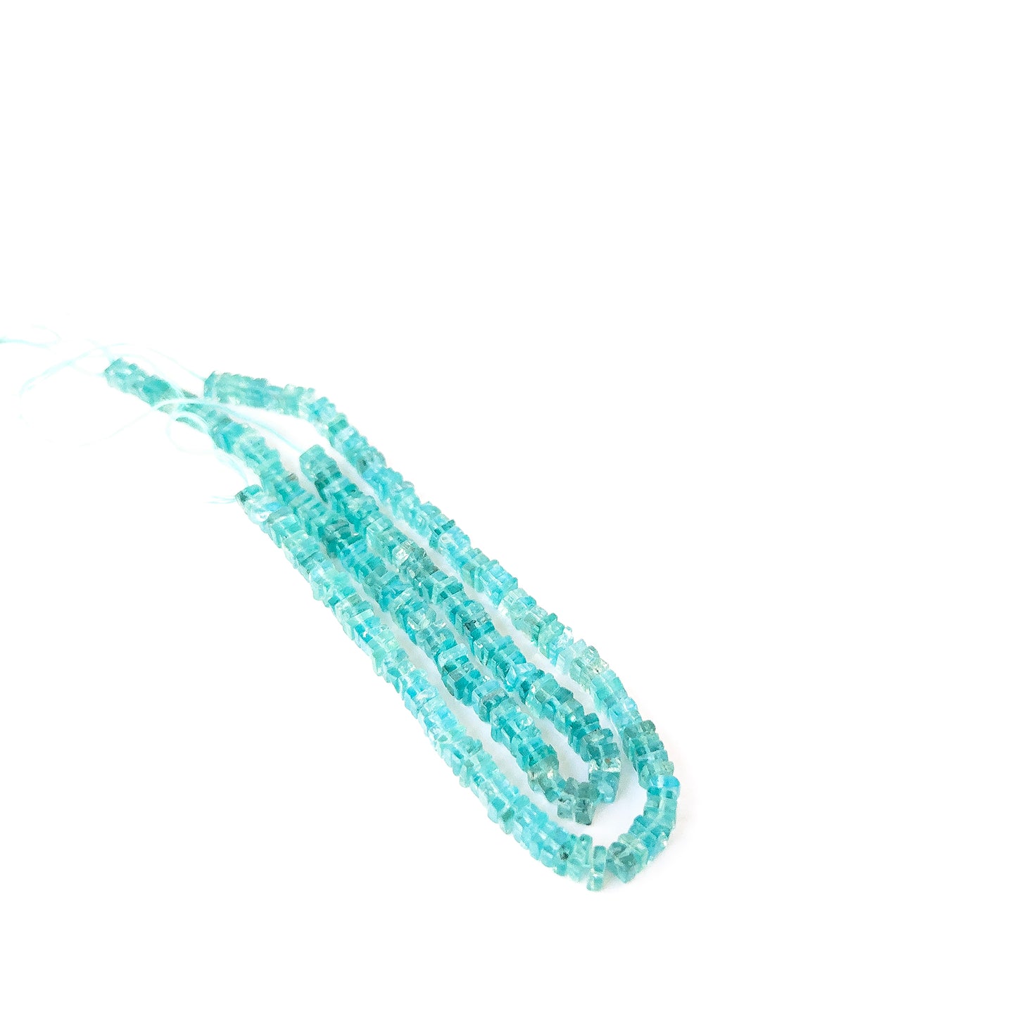 Premium Apatite heishi beads showcasing polished surfaces and natural blue‑green colour for artisan designs.