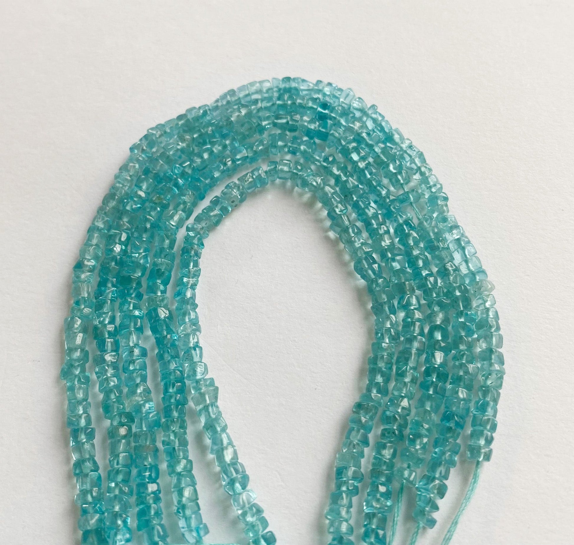 Beautiful Apatite gemstone beads 3.5mm showcasing a blend of deep blue hues and smooth textures ideal for artisan jewellery making.