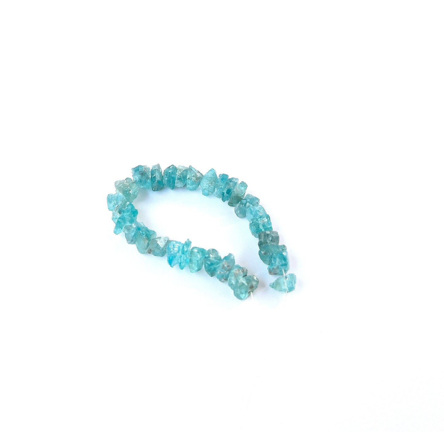 Premium Apatite undrilled rough pieces showcasing natural texture and rich colour for artisan jewellery making.