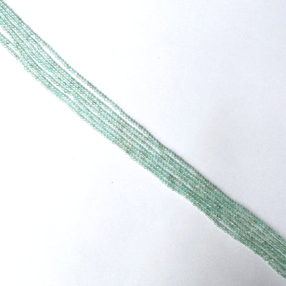 Aquamarine faceted rondelle beads in 1.9–2.0mm size with subtle blue colour and glistening finish.
