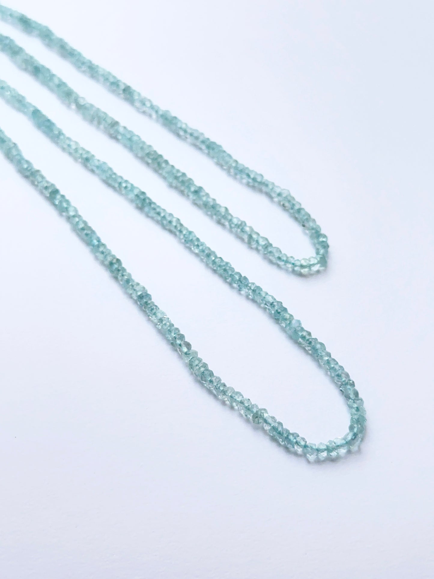 Lavender Opal faceted rondelle natural gemstone beads in 7.4–7.8mm on a 16cm strand, showing soft lilac sparkle for DIY jewellery.