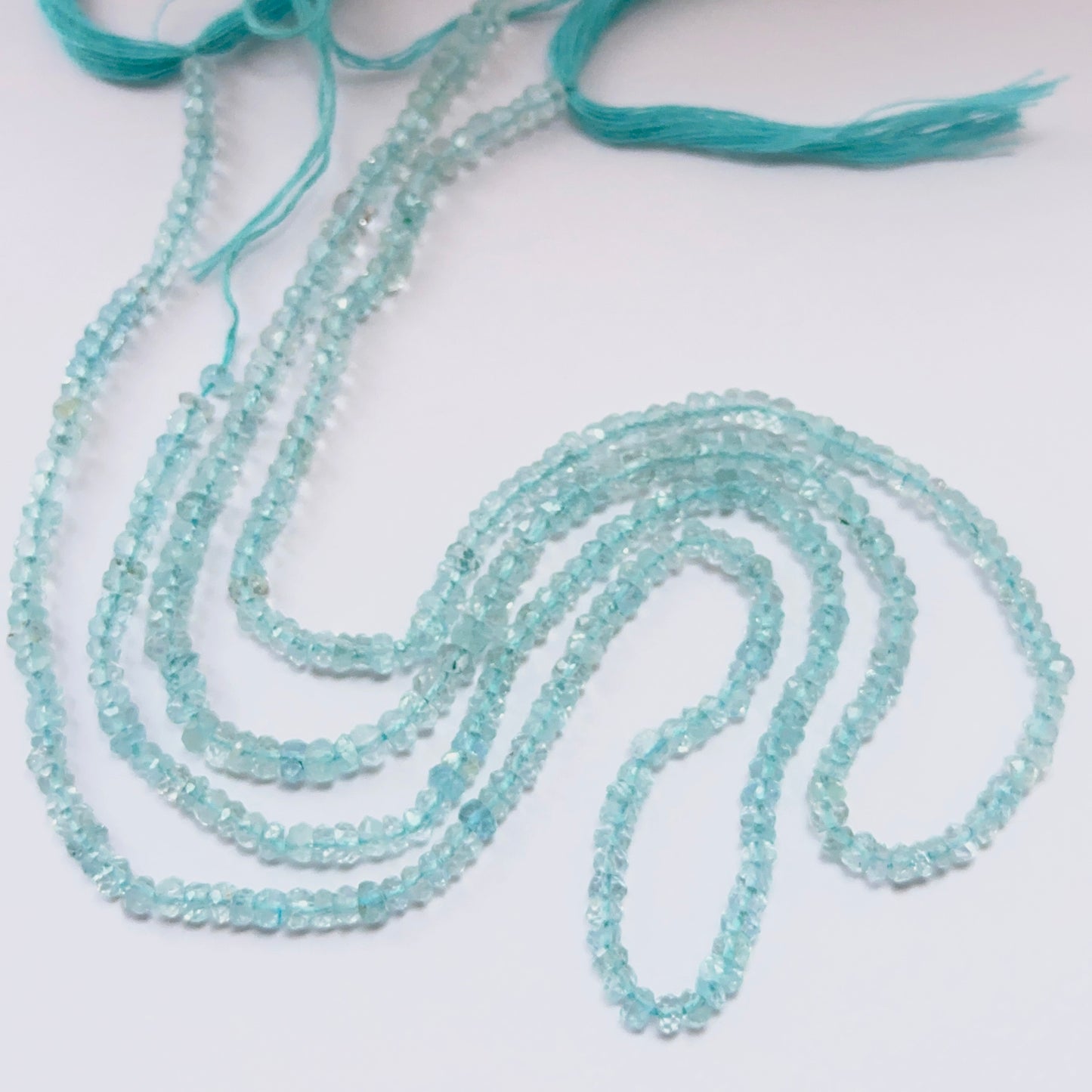 Lavender Opal natural gemstone beads in faceted rondelle shape, ideal for artisan jewellery and creative DIY beadwork.