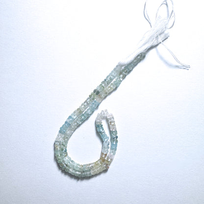 Aquamarine smooth wheel beads, 4.5-4.8mm, strung on 33cm strand, ideal for versatile handmade jewellery components.