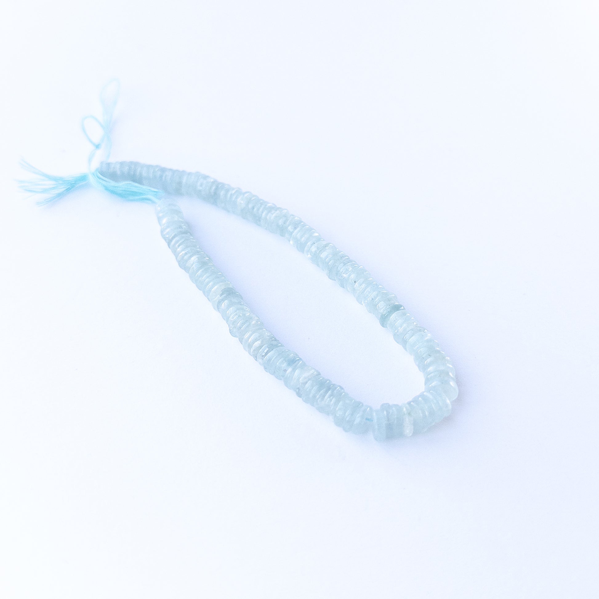 Authentic Aquamarine gemstone beads showcasing smooth wheel cuts ideal for handmade jewellery components.