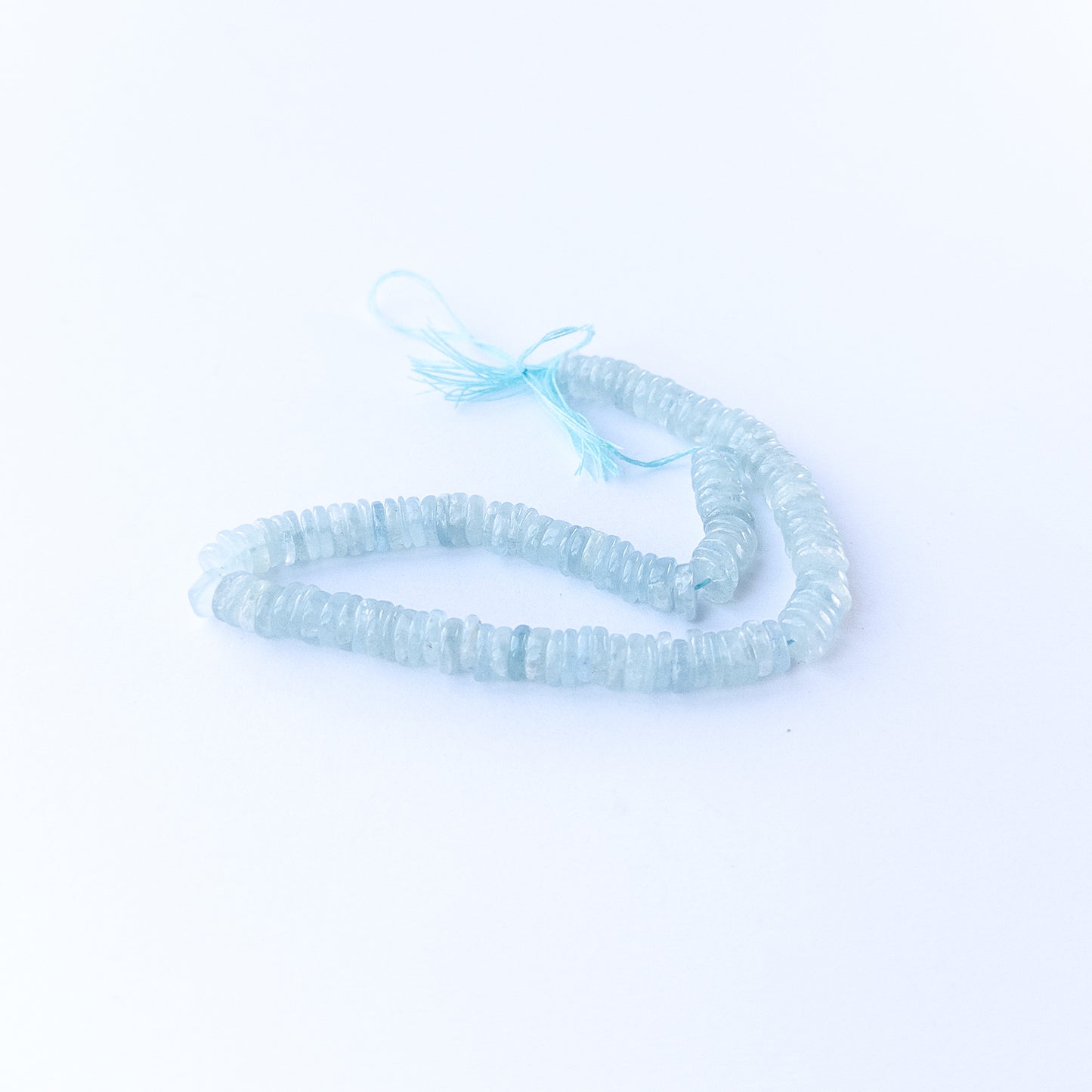 High‑quality Aquamarine wheel beads with calming blue tones perfect for gemstone bead jewellery making.