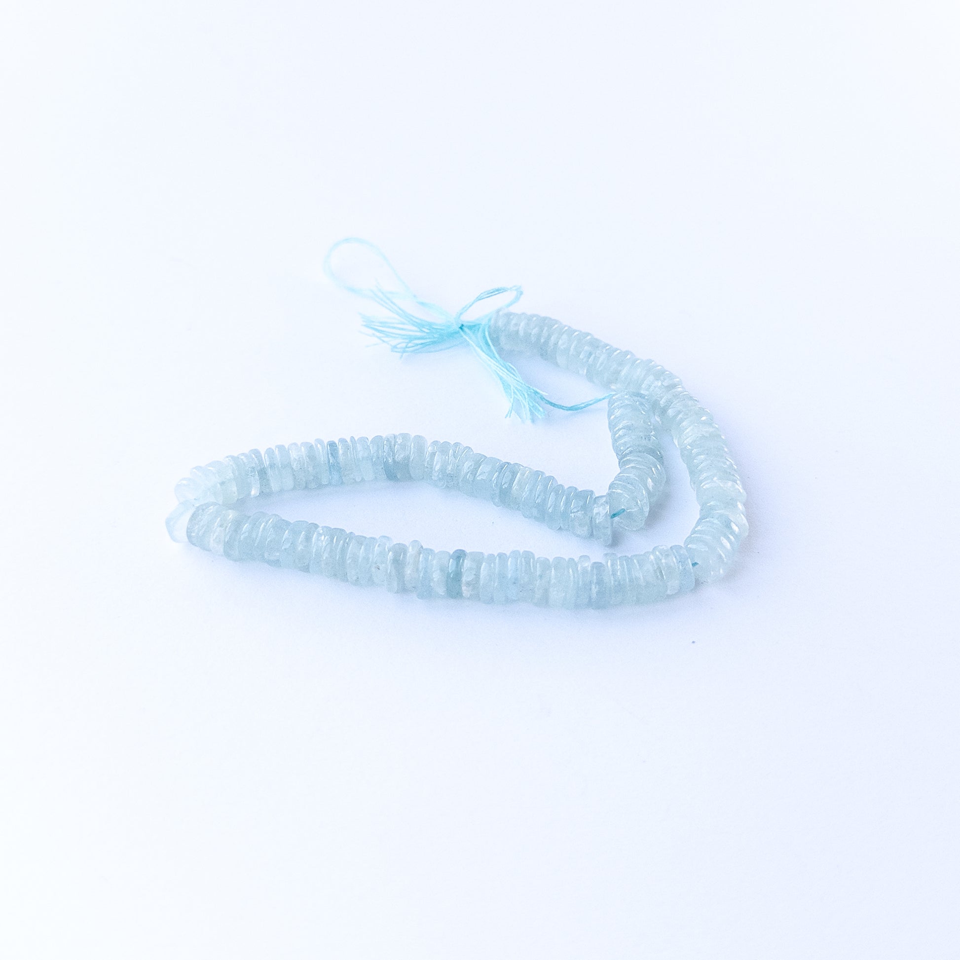 High‑quality Aquamarine wheel beads with calming blue tones perfect for gemstone bead jewellery making.