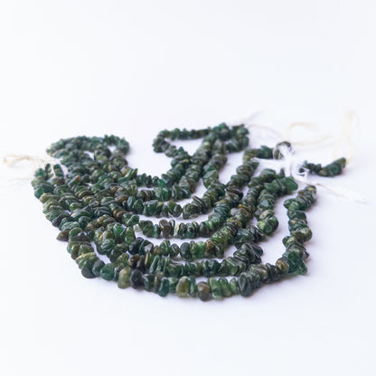 Genuine Aventurine chip and nugget gemstone beads in a 22cm strand with natural green shine.