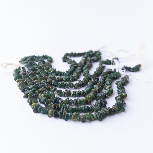 Genuine Aventurine chip and nugget gemstone beads in a 22cm strand with natural green shine.