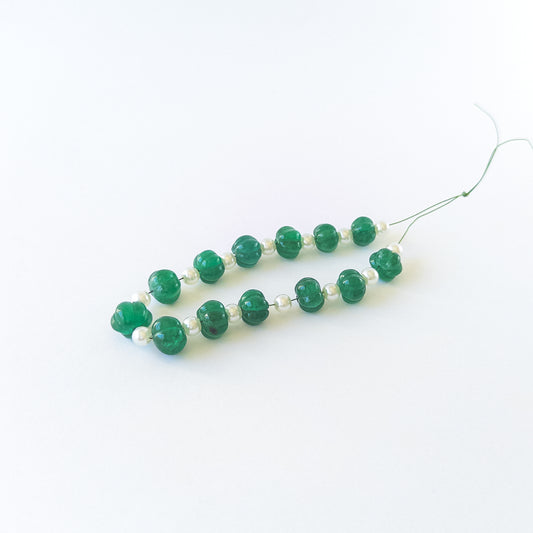 High‑quality pumpkin‑cut beads with polished shine and elegant arrangement ideal for handcrafted jewellery.