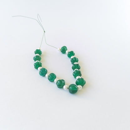 Authentic Beryl and Shell Pearl gemstone beads displaying soft colours and sculpted detailing for DIY jewellery makers.