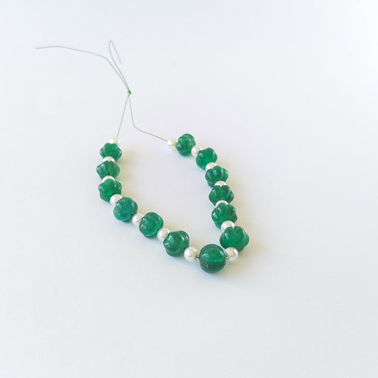 Authentic Beryl and Shell Pearl gemstone beads displaying soft colours and sculpted detailing for DIY jewellery makers.