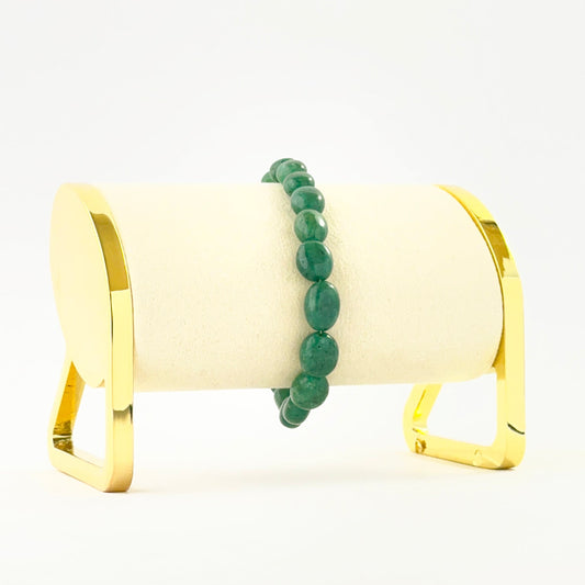 Elegant smooth oval beryl emerald bracelet crafted in a single adjustable strand.