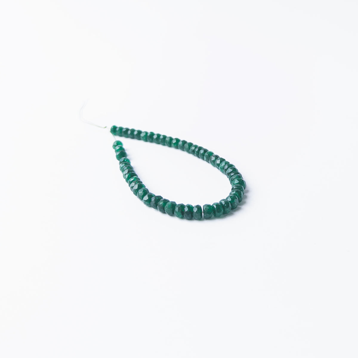 Genuine Beryl stone beads with crisp faceting arranged neatly for DIY jewellery designers.
