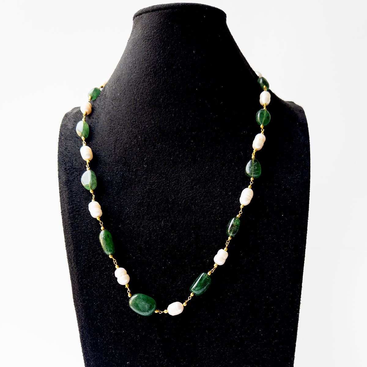 Genuine Beryl gemstone jewellery showcasing polished smooth tumble beads and radiant Freshwater Pearl highlights.