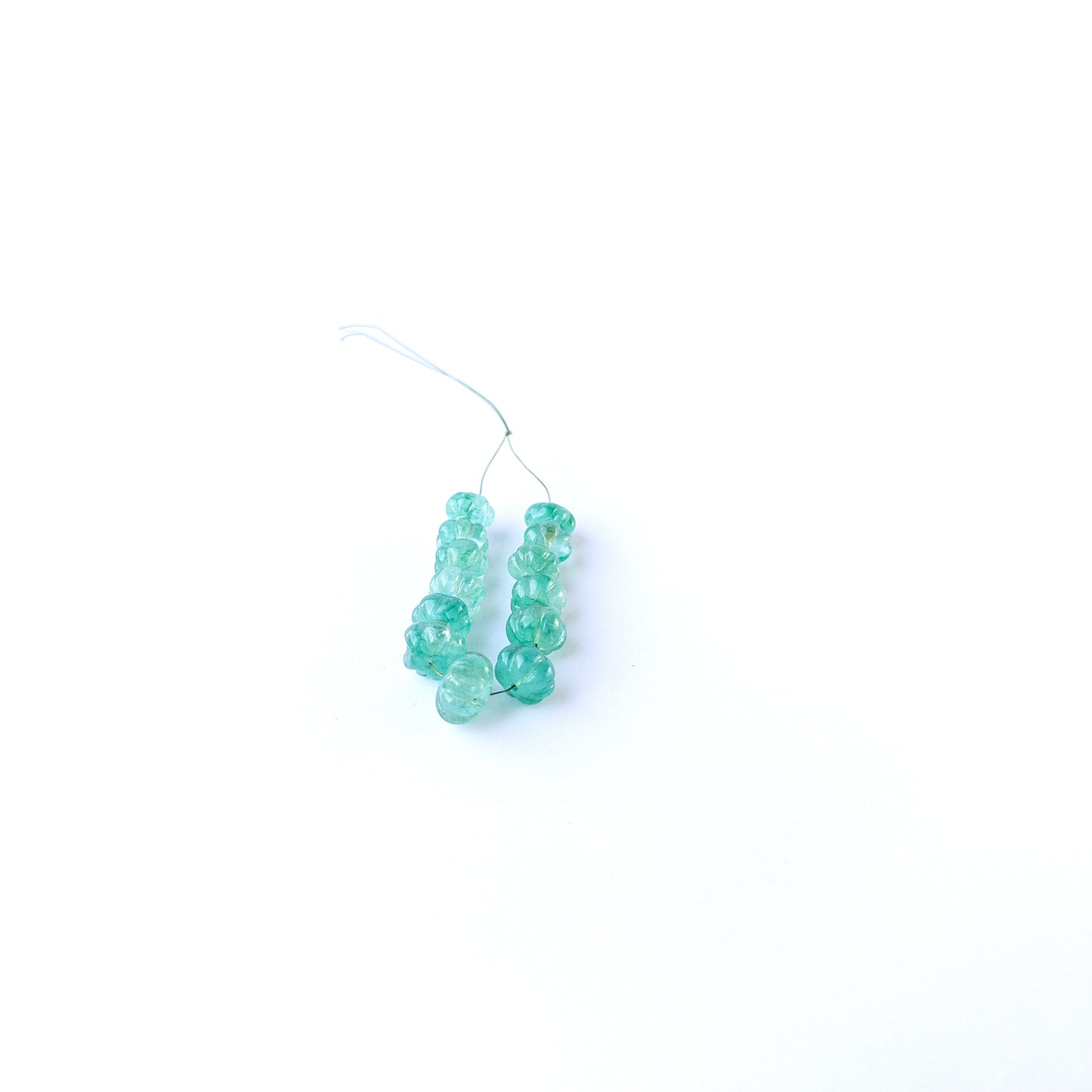 Authentic beryl gemstone beads featuring pastel hues and textured pumpkin carving for premium jewellery making.