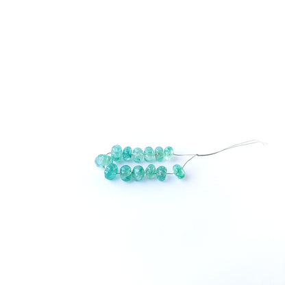 Handmade jewellery components with natural beryl pumpkin‑cut beads arranged in a 13‑piece set.