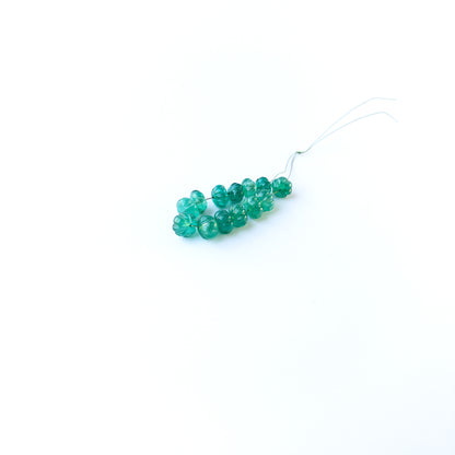 Authentic beryl gemstone beads featuring pastel hues and textured pumpkin carving for premium jewellery making.