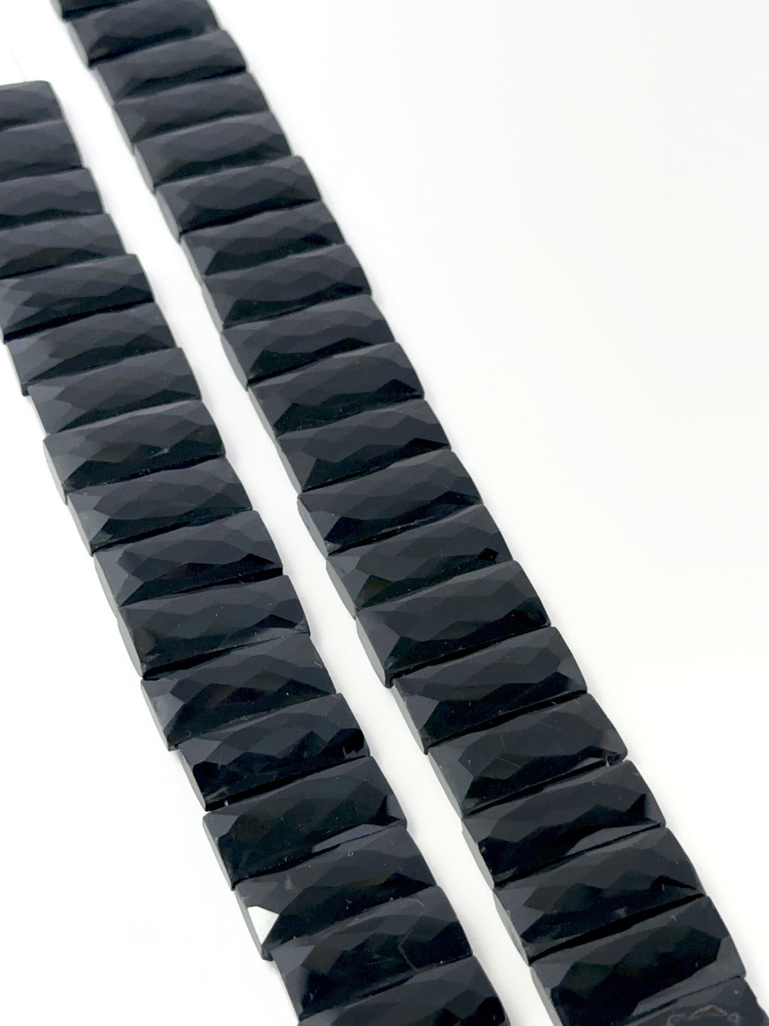 Black Onyx faceted rectangle stone beads showing bold colour and shine, ideal for genuine gemstone beads in DIY jewellery.