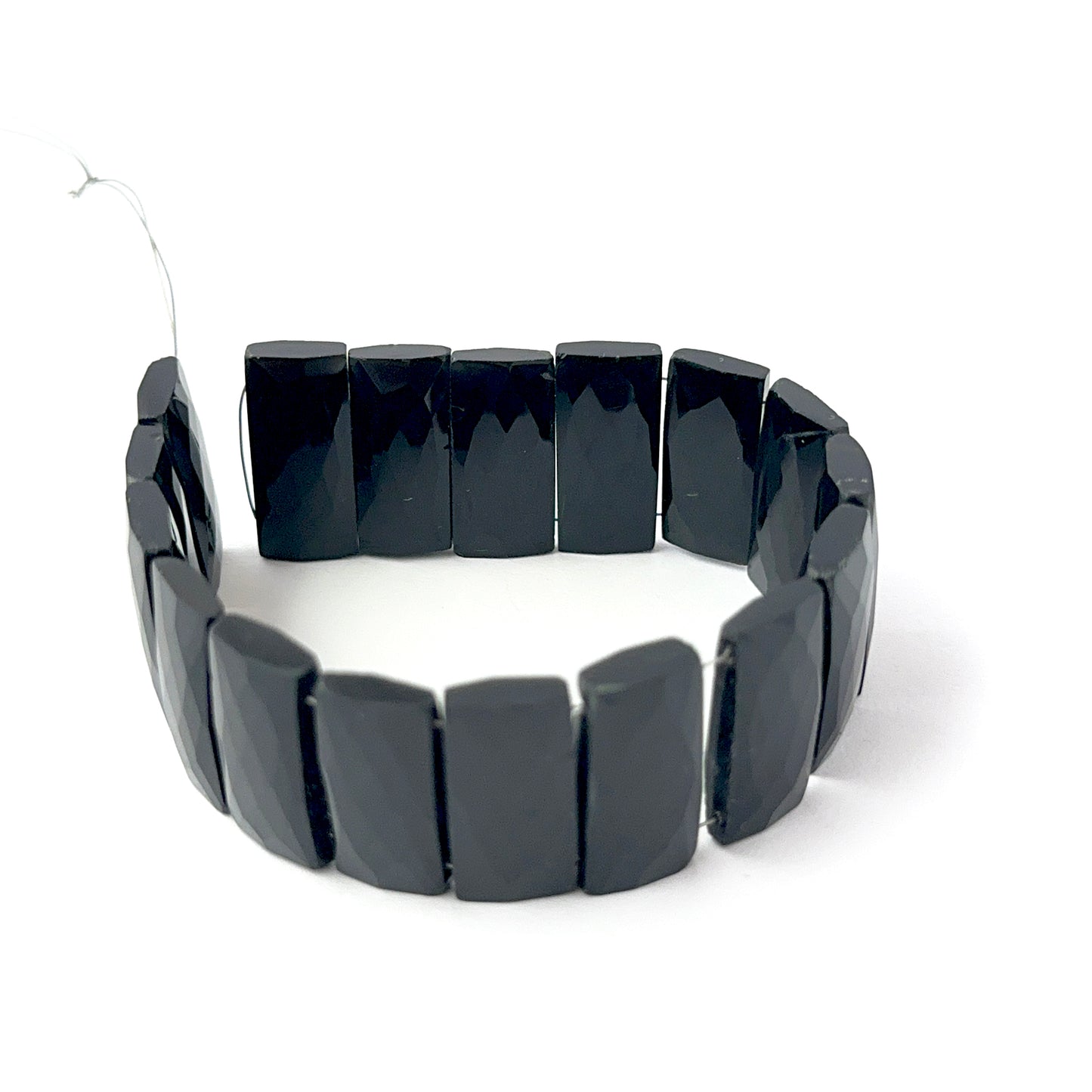 Black Onyx faceted rectangle beads with reflective surfaces, perfect for authentic gemstone beads and creative jewellery designs.
