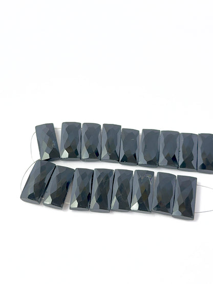 Genuine Black Onyx faceted rectangle gemstone beads showing smooth polish and deep shine, ideal for stone beads used in DIY jewellery.