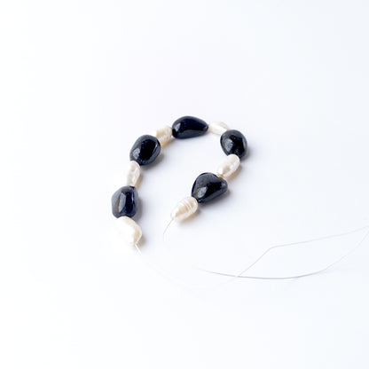 Black Sapphire and Freshwater Pearl gemstone beads for DIY jewellery offering timeless sophistication and natural beauty.