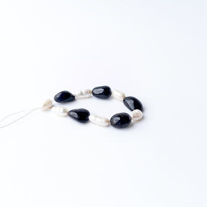 Authentic Black Sapphire and Freshwater Pearl stone beads with smooth tumble shapes for elegant jewellery creations.