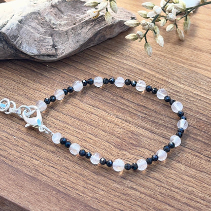 Black spinel and crystal bracelet showing smooth round beads and elegant shine for jewellery styling.
