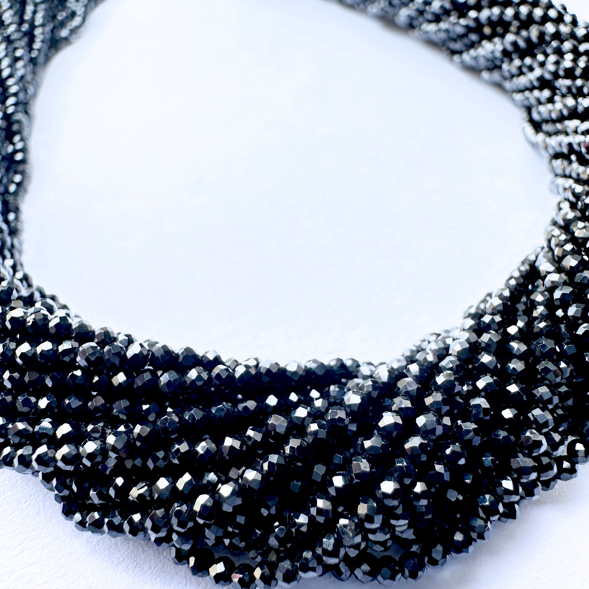 Natural gemstone beads in Black Spinel, 1.7-1.9mm size, ideal for elegant DIY jewellery designs.